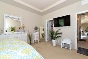 A picture containing indoor, wall, ceiling, bed

Description automatically generated