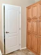 A white door in a room

Description automatically generated with medium confidence
